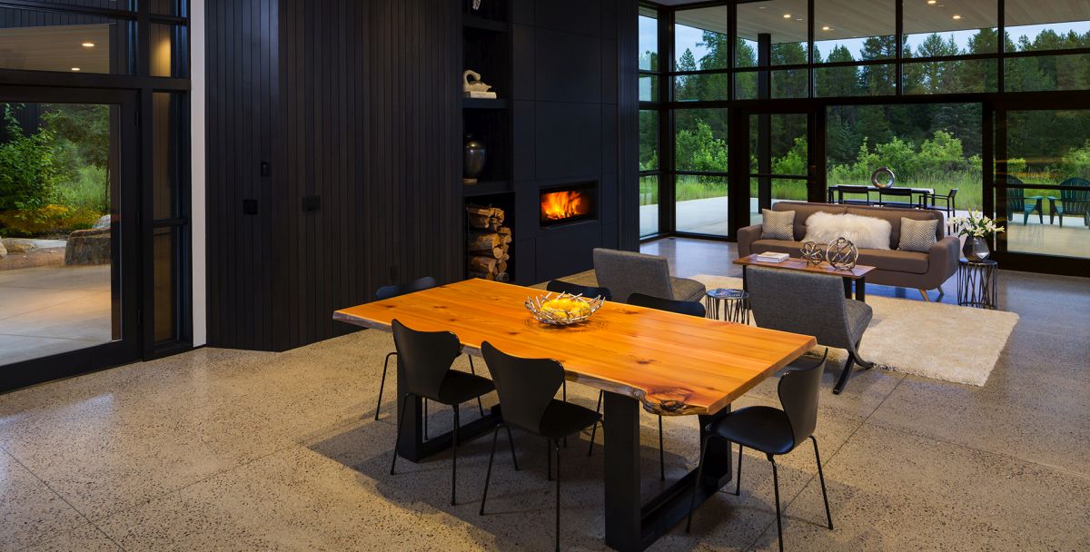 The wood-burning fireplace creates a very warm and welcoming ambiance in the living area