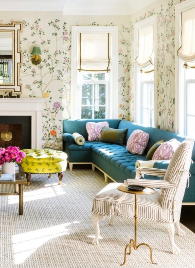 traditional living room with teal velvet sofa