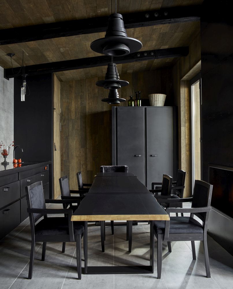 The two main materials used in this project are black-painted steel and artificially-aged wood