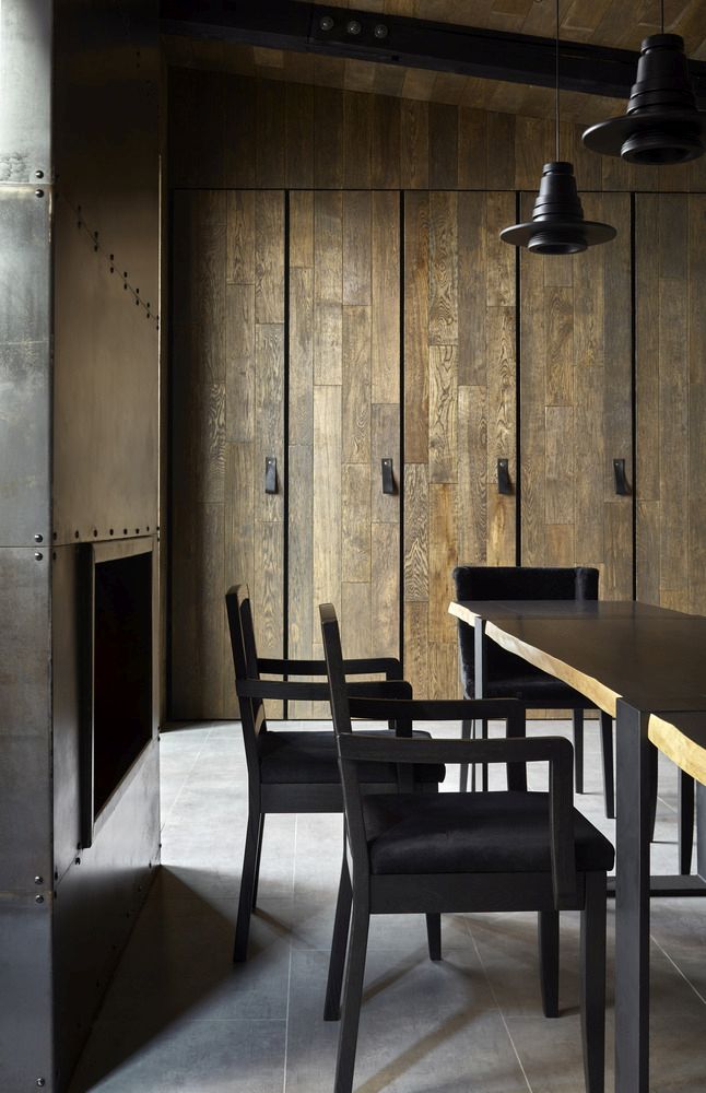 The wooden surfaces add a very warm and inviting touch to the design