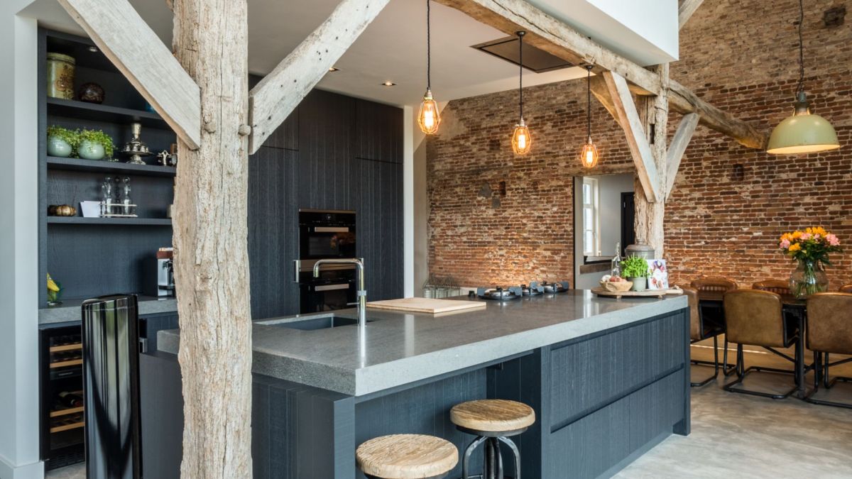 Overall, the color palette is reduced to a few neutrals meant to complement the original elements