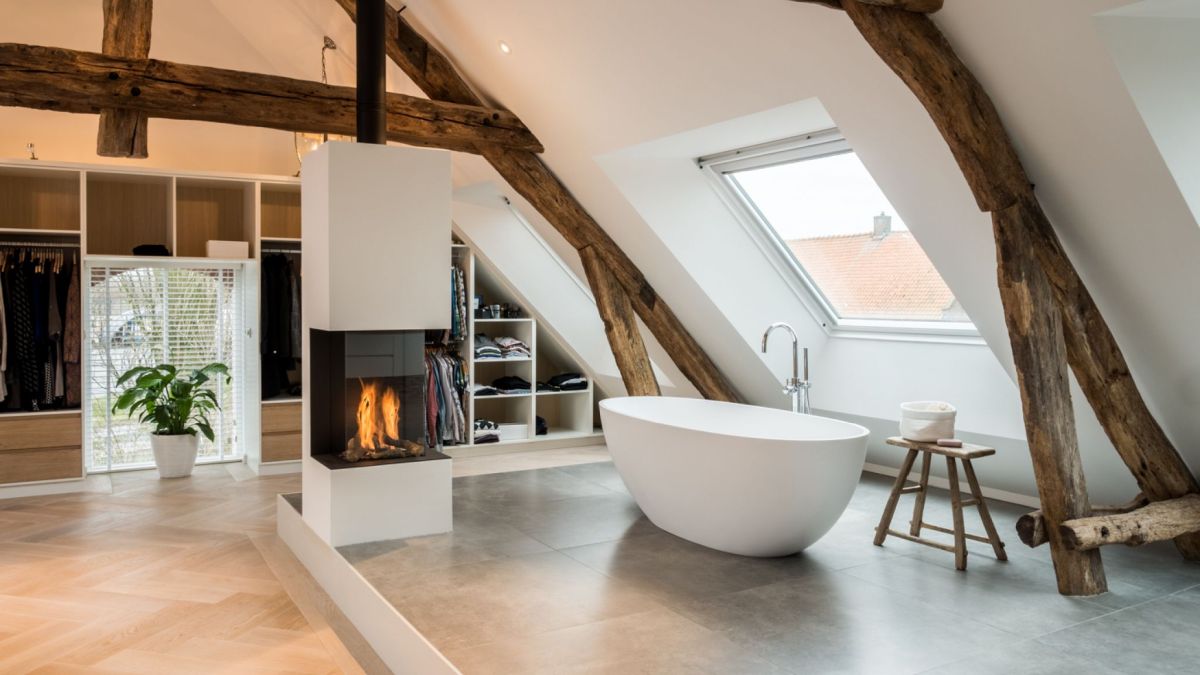 A fireplace was embedded into a space divider here, marking the separation between the functions