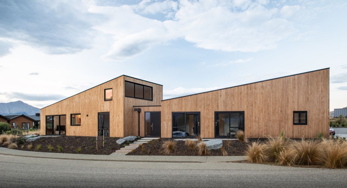 The two pavilions feature single pitch roofs which mimic the surrounding topography