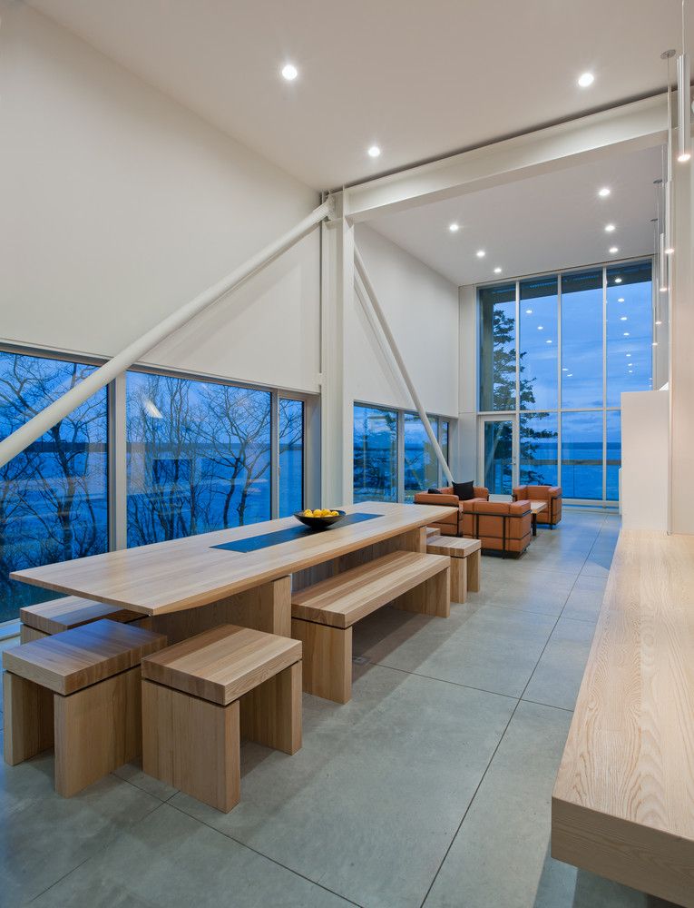 Inside, large windows expose the spaces to the gorgeous views and bring in lots of natural light