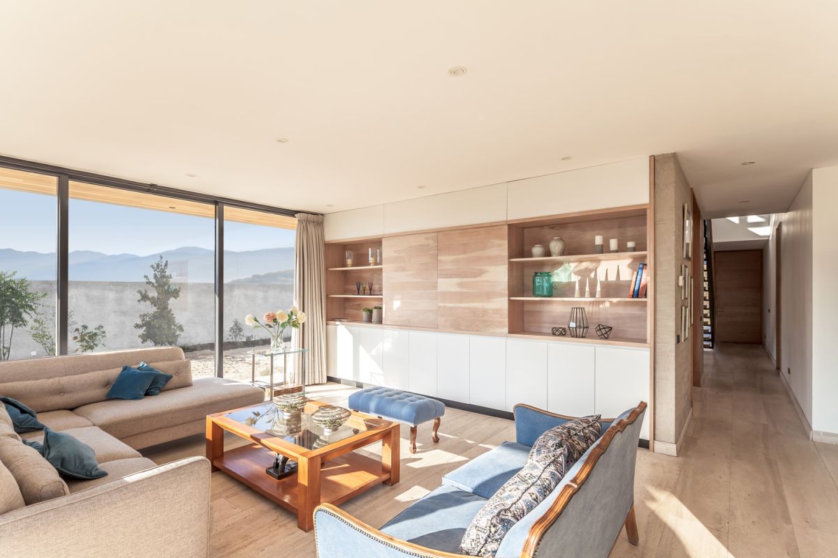 The palette of colors is reduced to soft and warm neutrals with subtle hints of blue