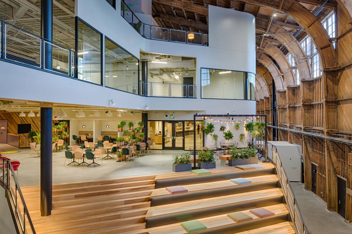 The new office is a four-story high structure, with floor plans that vary in shape and size