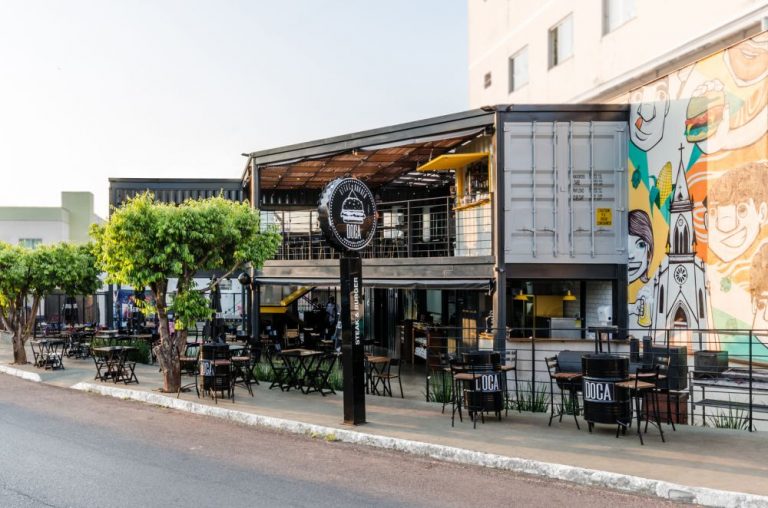 Urban Shipping Container Restaurant With A Beautiful Wooden Pergola