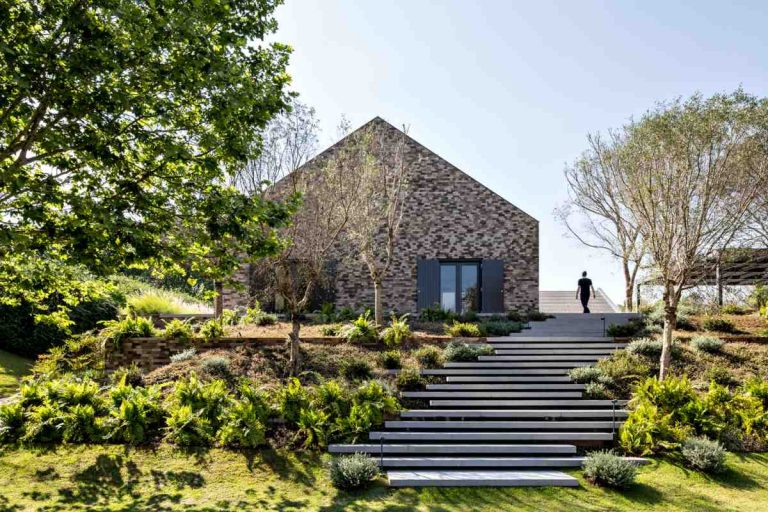 A Cozy Home In Brazil Split Into 3 Barn-Like Buildings